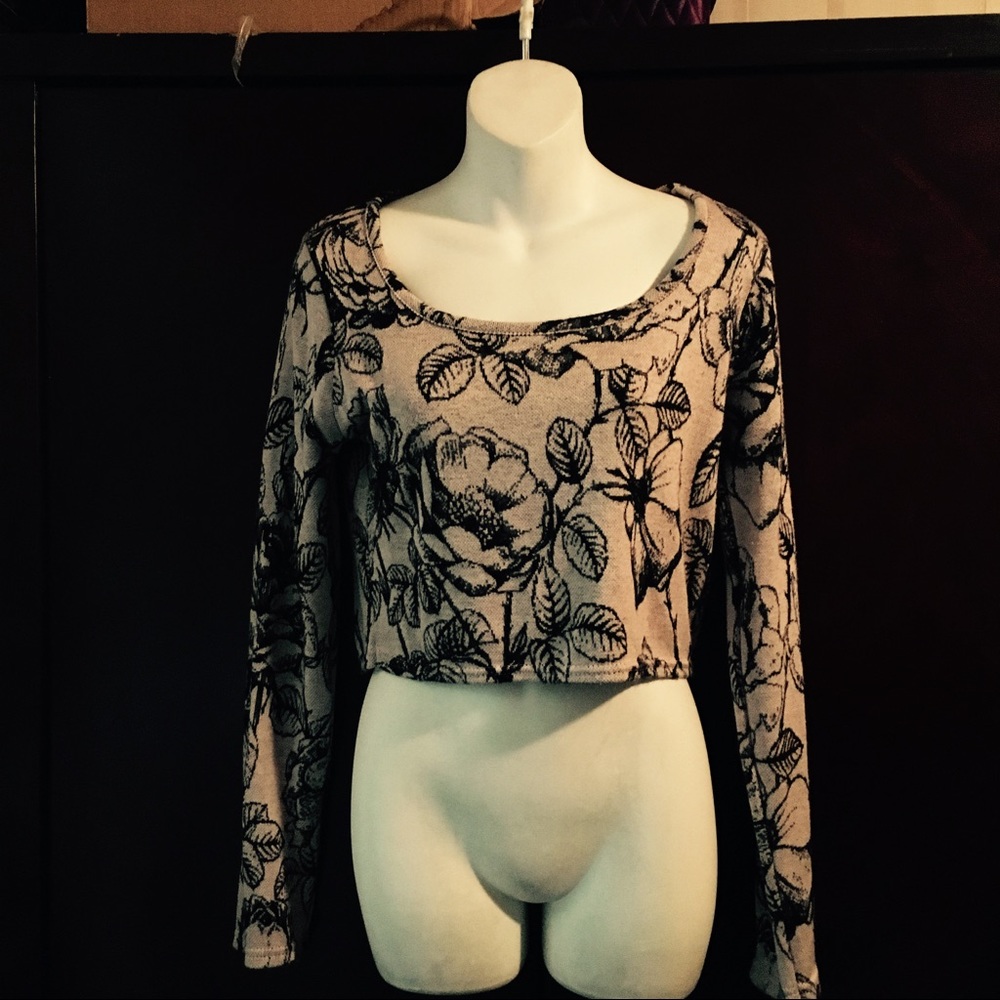 Like pink and black long sleeve crop top